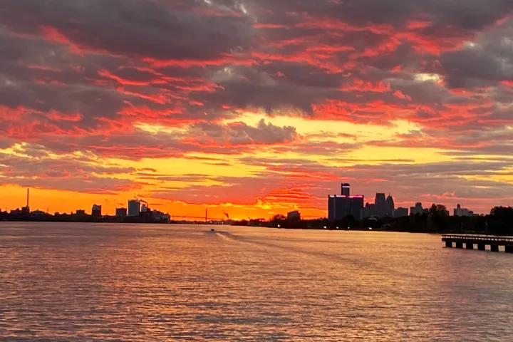 a sunset over a body of water