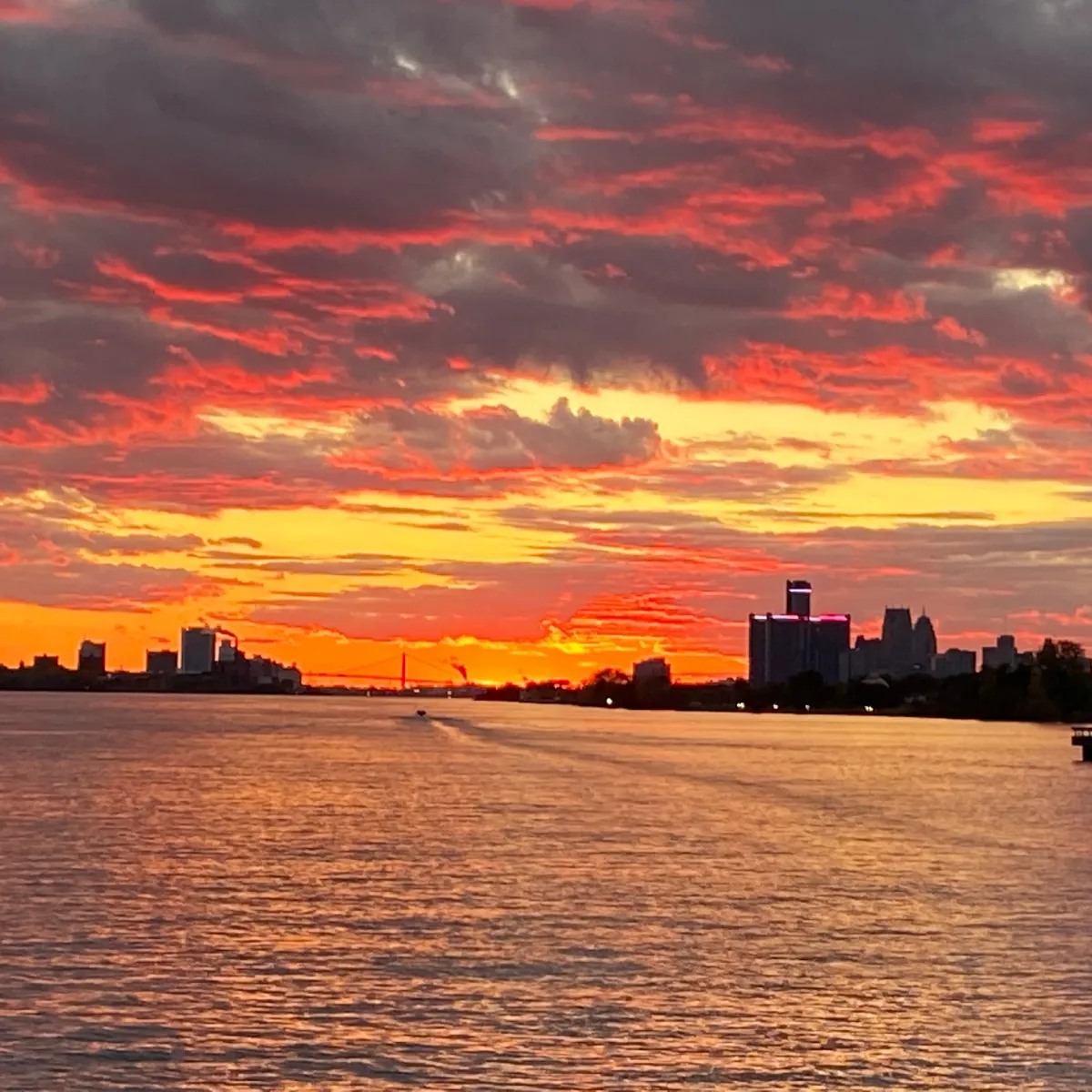a sunset over a body of water