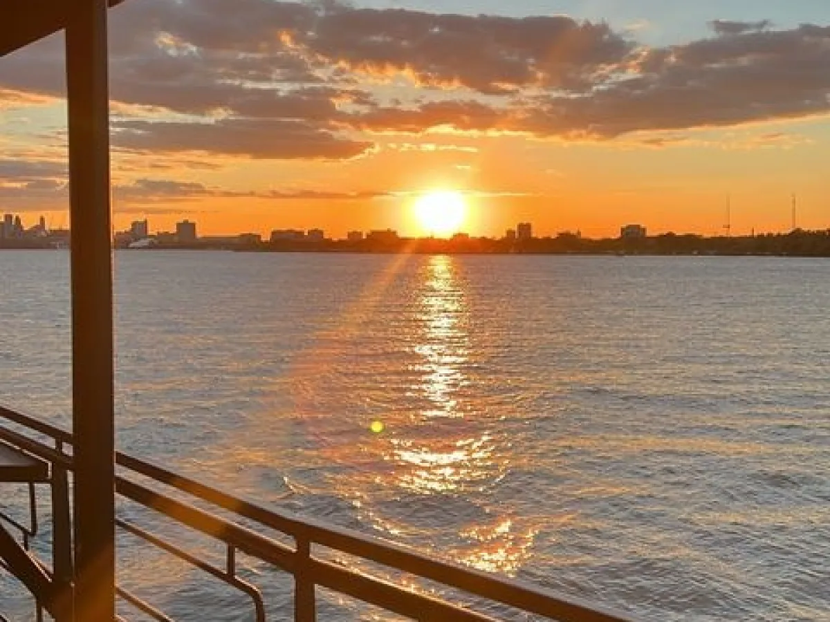a view of a pier next to a body of water