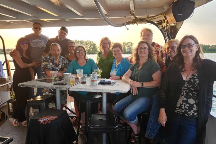 a group of people posing for the camera