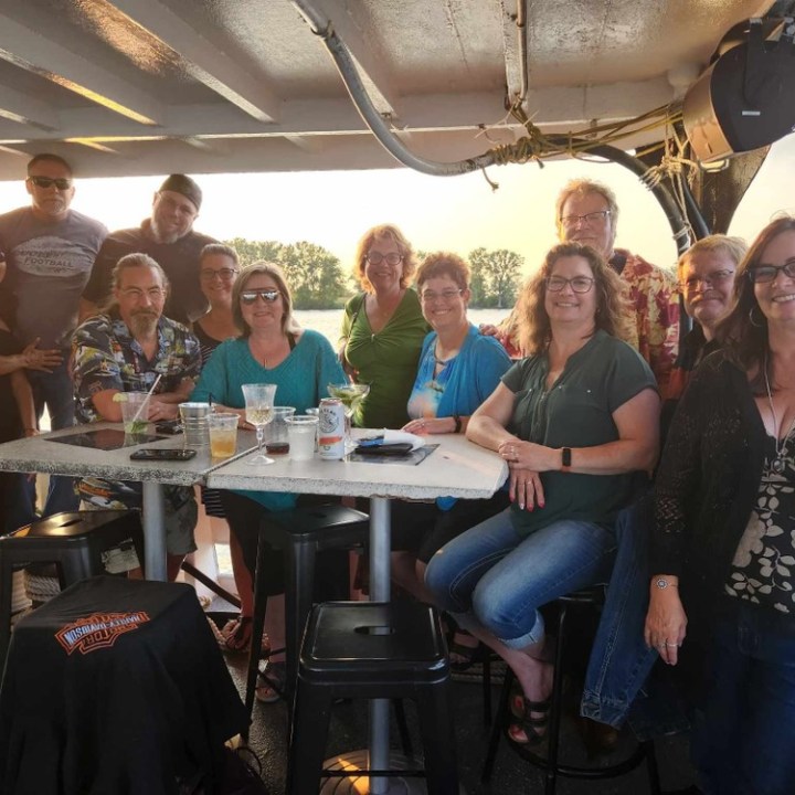 a group of people posing for the camera