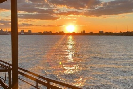 a view of a pier next to a body of water