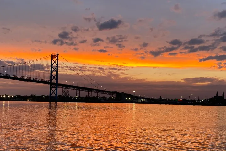 a sunset over a body of water