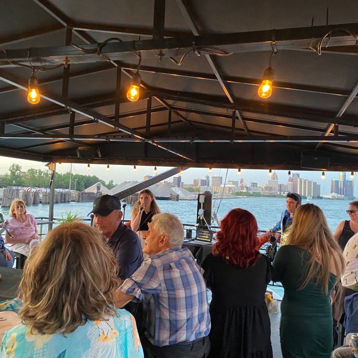 a group of people standing in front of a crowd