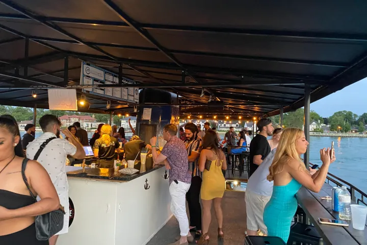 a group of people standing in front of a crowd