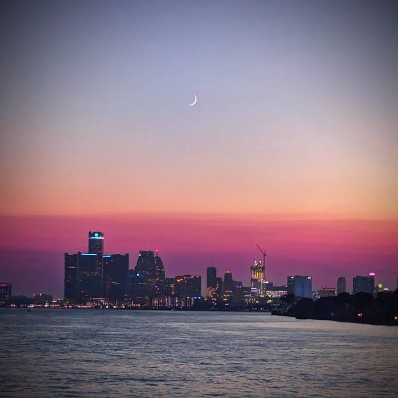 a rainbow over a body of water