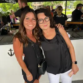 a couple of people posing for the camera