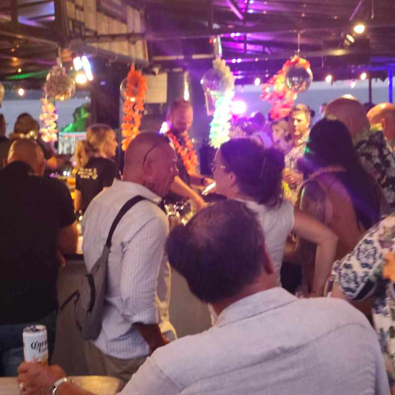 a group of people standing in front of a crowd