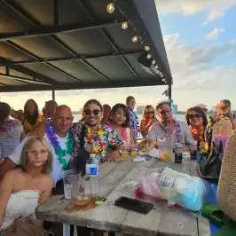 a group of people sitting at a table
