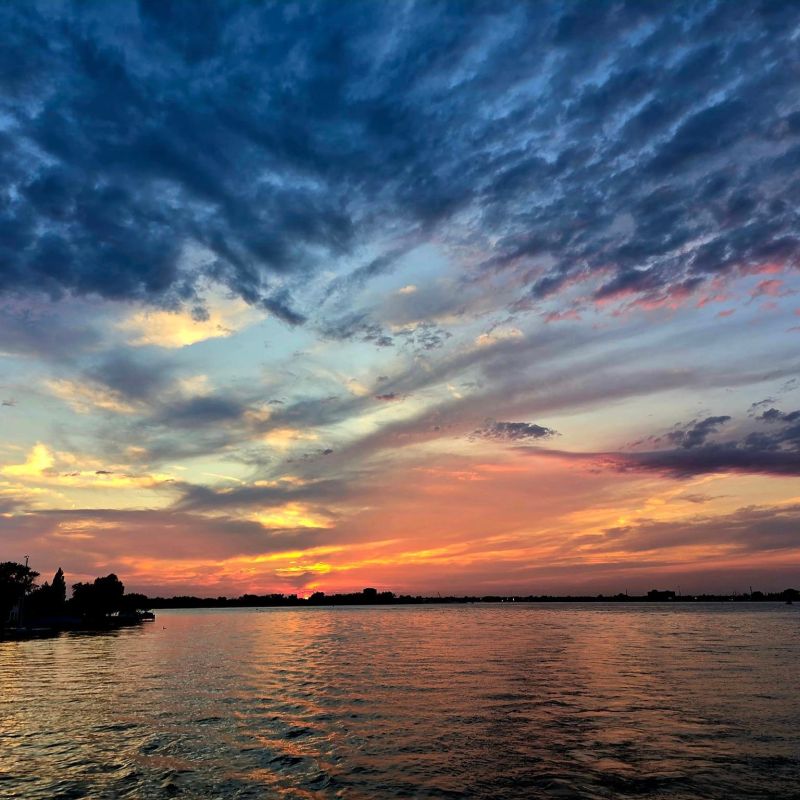 a sunset over a body of water