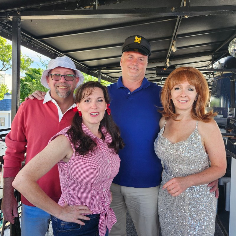 a group of people posing for the camera